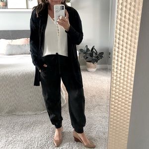 Black, jogger style work pant.